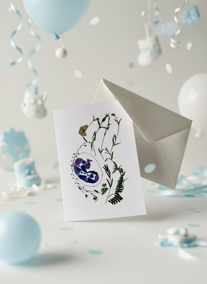 Card with a design of baby in womb.